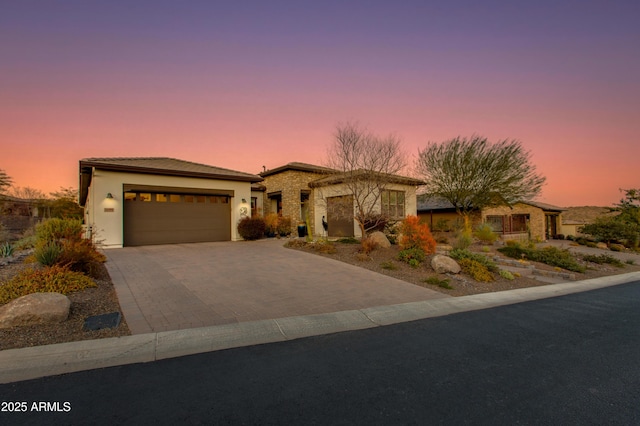 view of front of property featuring a garage