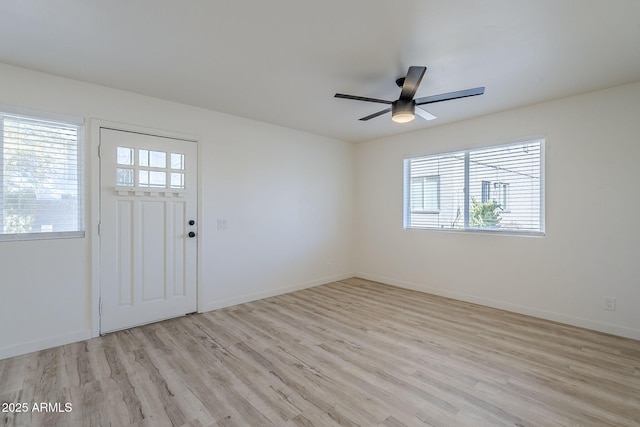 foyer featuring ceiling fan and light hardwood / wood-style floors