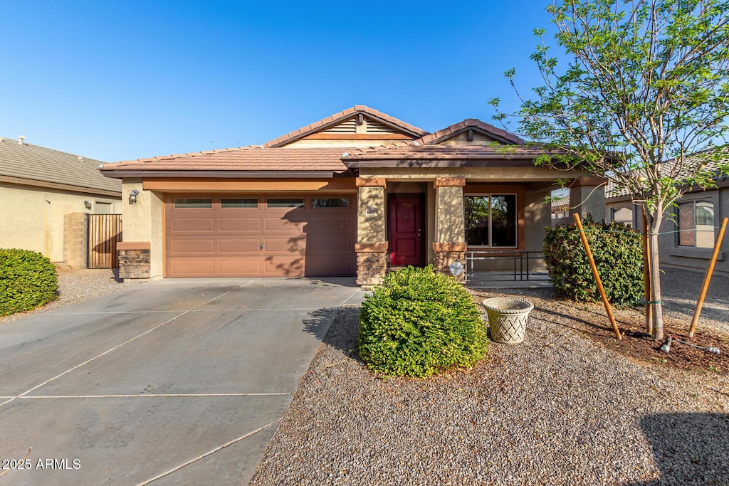 view of front of home with a garage