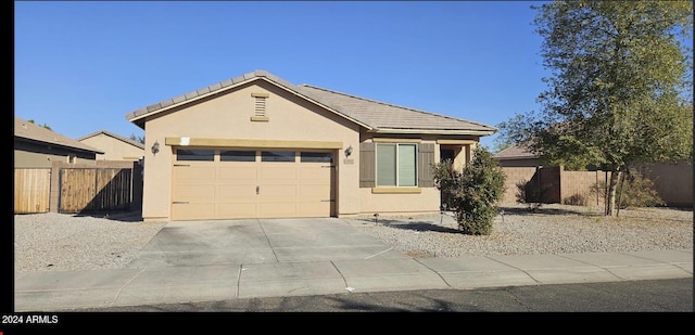 single story home featuring a garage