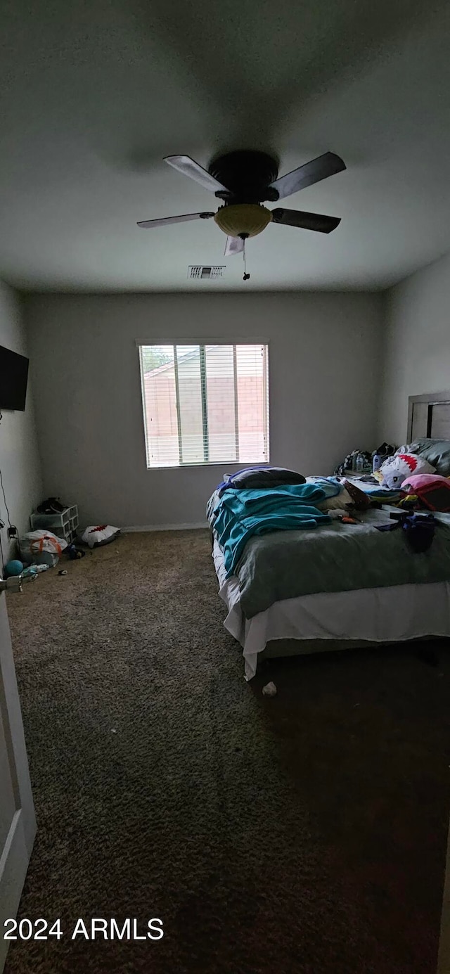 bedroom featuring carpet flooring and ceiling fan