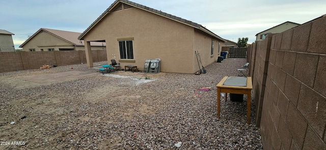 back of house with a patio area