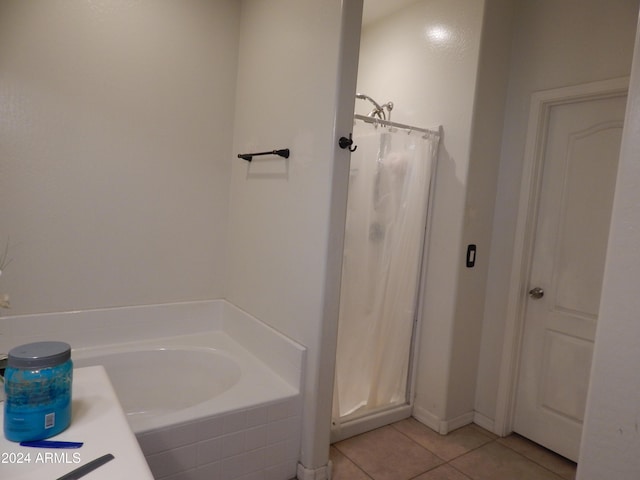 25422 W Maldonado Ct, Buckeye, AZ 85326 - bathroom with a stall shower, a bath, and tile patterned floors