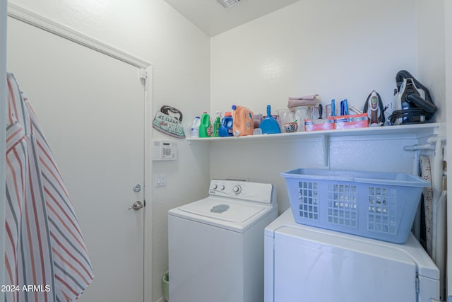 laundry area featuring separate washer and dryer