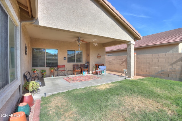 exterior space featuring ceiling fan and a patio