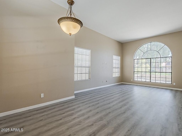 13064 N 100th Pl, Scottsdale, AZ 85260 - unfurnished room with wood finished floors and baseboards
