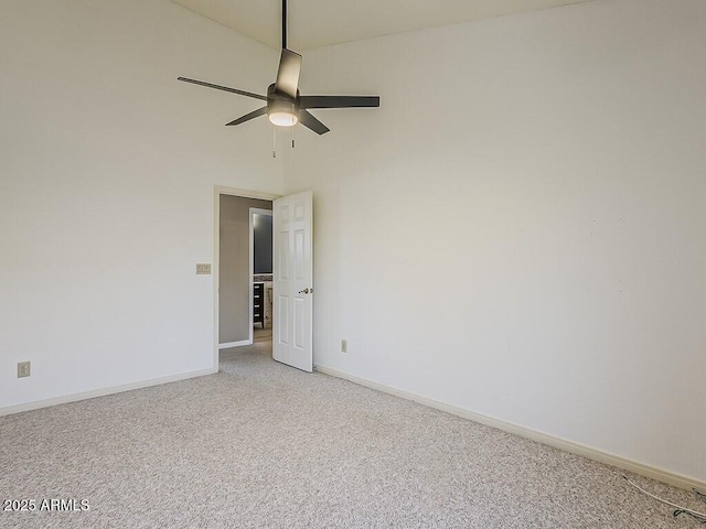 13064 N 100th Pl, Scottsdale, AZ 85260 - empty room featuring light carpet, a ceiling fan, and baseboards