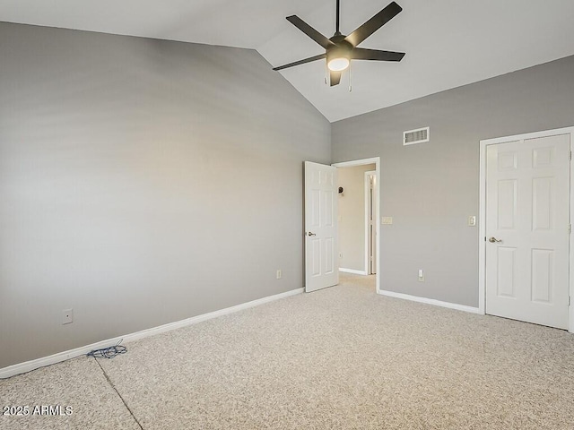 13064 N 100th Pl, Scottsdale, AZ 85260 - unfurnished bedroom with baseboards, high vaulted ceiling, light carpet, and ceiling fan