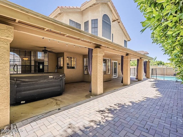 13064 N 100th Pl, Scottsdale, AZ 85260 - view of patio with a hot tub and a ceiling fan