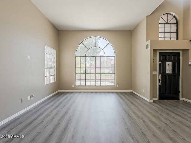 13064 N 100th Pl, Scottsdale, AZ 85260 - foyer with wood finished floors and baseboards