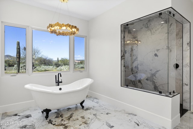 bathroom featuring plus walk in shower and an inviting chandelier