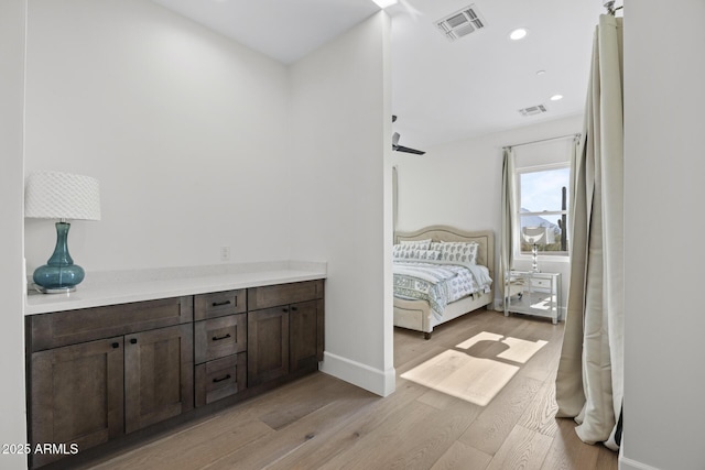 bedroom with light wood-type flooring