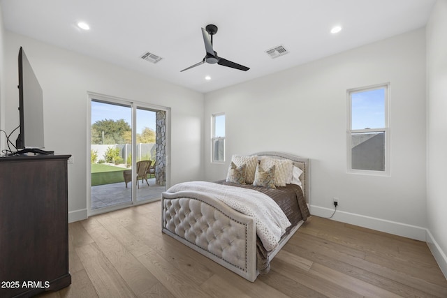 bedroom with light wood-type flooring, ceiling fan, and access to outside