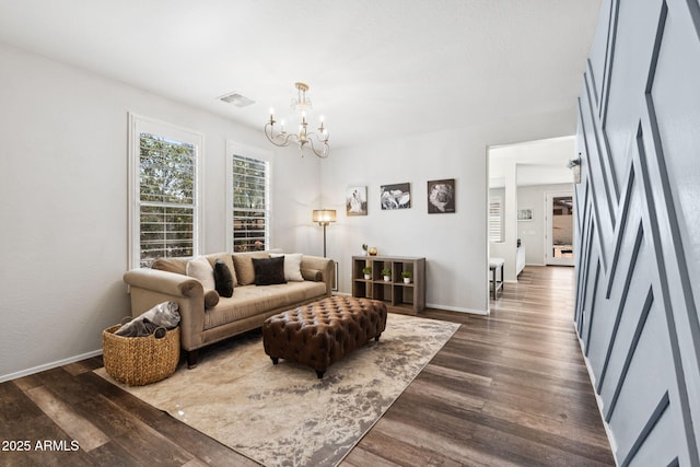 20518 W White Rock Rd, Buckeye, AZ 85396 - living room with a chandelier and dark wood-style flooring