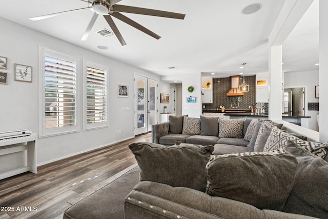 20518 W White Rock Rd, Buckeye, AZ 85396 - living room featuring ceiling fan and dark wood-style flooring