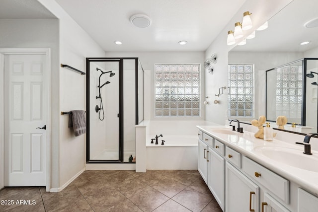 20518 W White Rock Rd, Buckeye, AZ 85396 - full bath with a garden tub, a shower stall, double vanity, tile patterned flooring, and recessed lighting