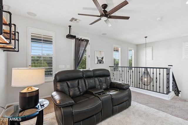 20518 W White Rock Rd, Buckeye, AZ 85396 - carpeted living room with a ceiling fan and healthy amount of natural light