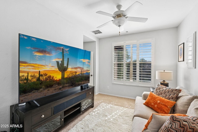 20518 W White Rock Rd, Buckeye, AZ 85396 - carpeted living area featuring a ceiling fan and baseboards