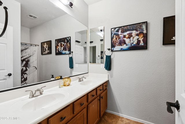 20518 W White Rock Rd, Buckeye, AZ 85396 - bathroom with double vanity, tile patterned flooring, and curtained shower