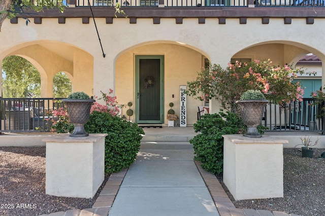 20518 W White Rock Rd, Buckeye, AZ 85396 - view of exterior entry featuring stucco siding and a porch