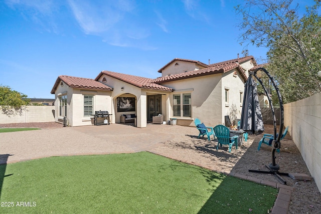 20518 W White Rock Rd, Buckeye, AZ 85396 - rear view of house with a fenced backyard, stucco siding, a patio area, and a tile roof