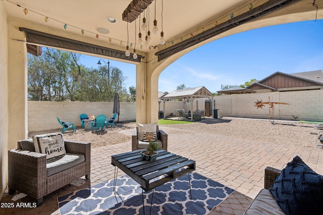 20518 W White Rock Rd, Buckeye, AZ 85396 - fenced backyard with a gazebo, a patio, and an outdoor living space