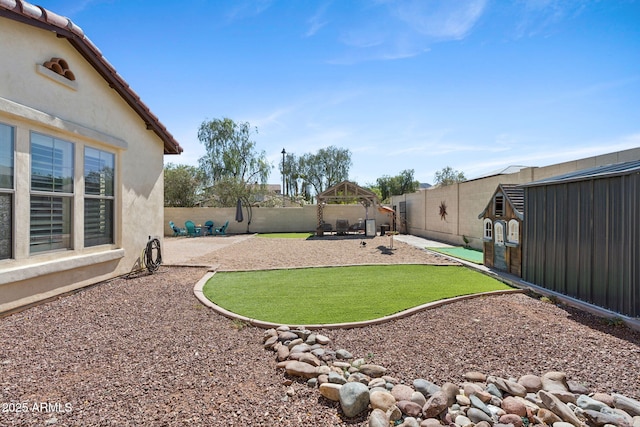 20518 W White Rock Rd, Buckeye, AZ 85396 - fenced backyard featuring a gazebo and a patio area