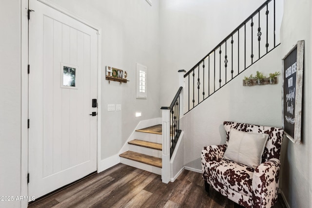 20518 W White Rock Rd, Buckeye, AZ 85396 - foyer entrance featuring dark wood finished floors, stairs, and a high ceiling
