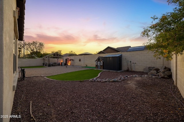20518 W White Rock Rd, Buckeye, AZ 85396 - fenced backyard featuring a gazebo, a storage shed, and a playground