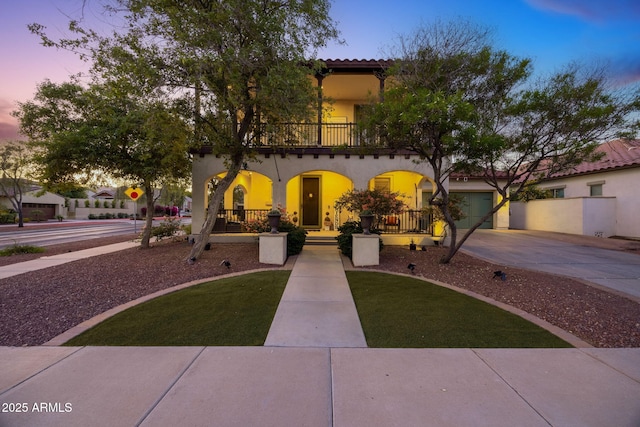 20518 W White Rock Rd, Buckeye, AZ 85396 - mediterranean / spanish home with a balcony and stucco siding