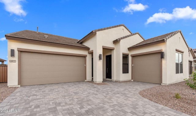 view of front of home with a garage