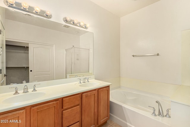 bathroom with vanity, separate shower and tub, and tile patterned flooring