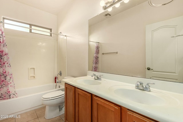 full bathroom featuring shower / tub combo, vanity, toilet, and tile patterned flooring