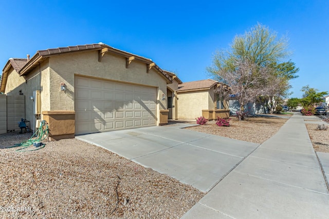 ranch-style house featuring a garage