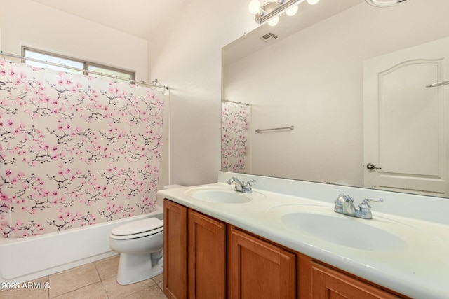 full bathroom with vanity, tile patterned floors, toilet, and shower / bath combo with shower curtain