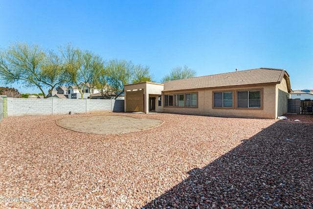 rear view of property with a patio area