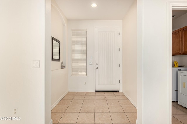 entrance foyer with light tile patterned floors