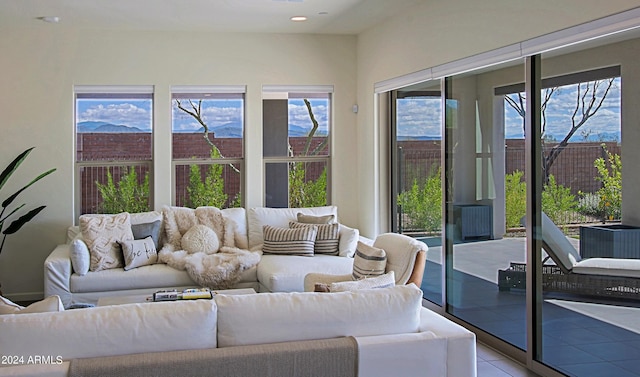 living room featuring light tile floors