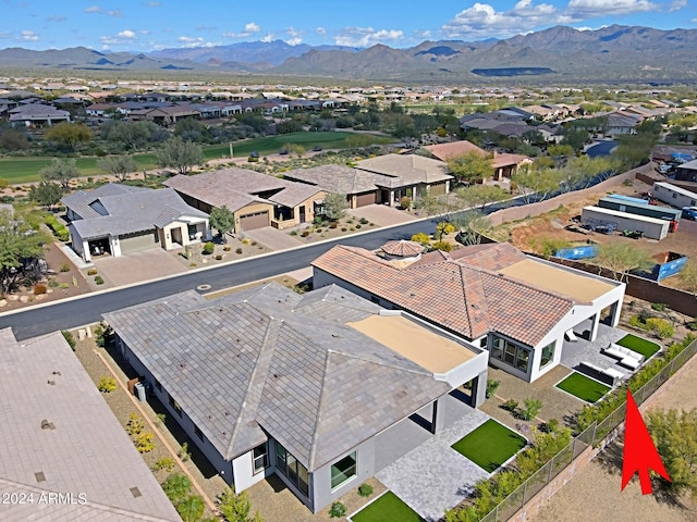 drone / aerial view featuring a mountain view