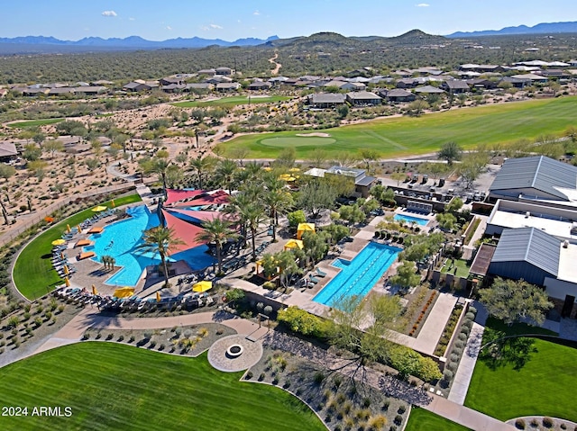 birds eye view of property featuring a mountain view