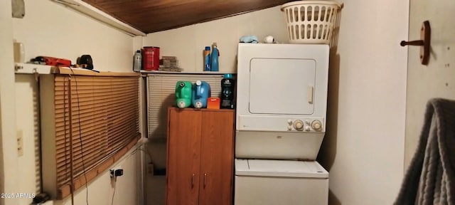 washroom with stacked washer and dryer and wooden ceiling