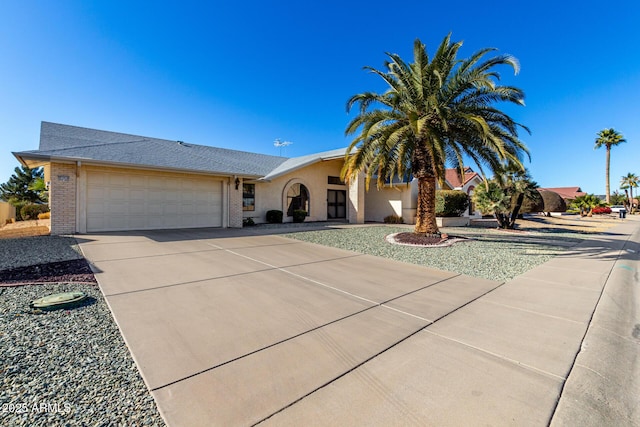 view of front of property with a garage