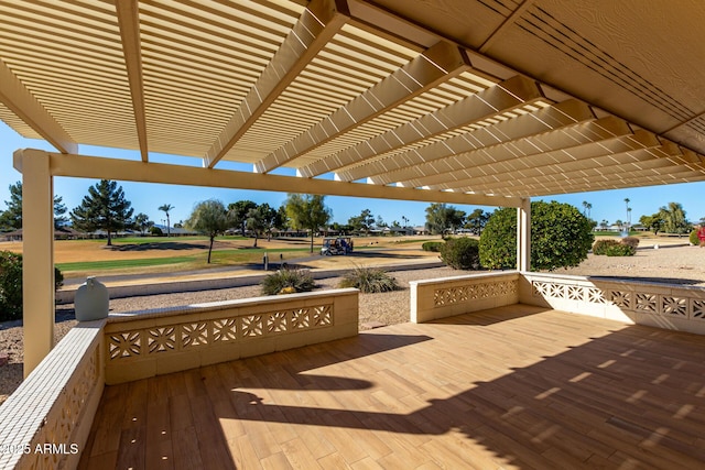 wooden terrace with a pergola