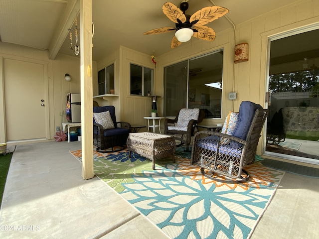 view of patio featuring ceiling fan