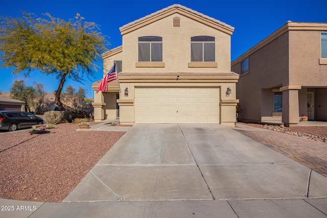 front of property with a garage