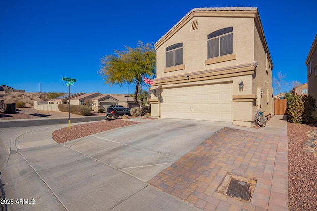 view of side of home featuring a garage