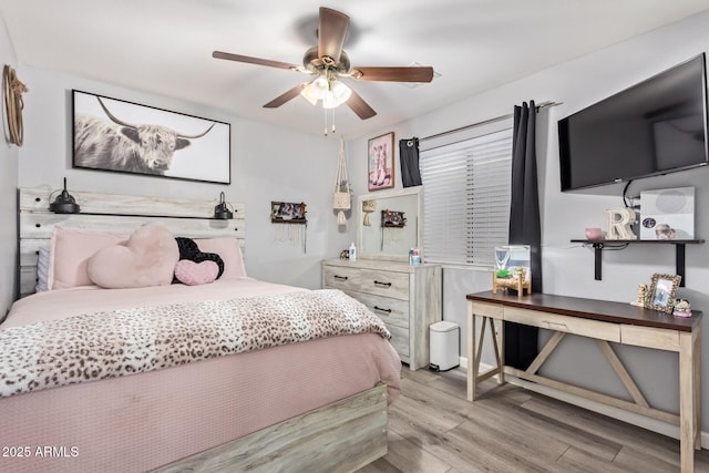 bedroom with light hardwood / wood-style floors