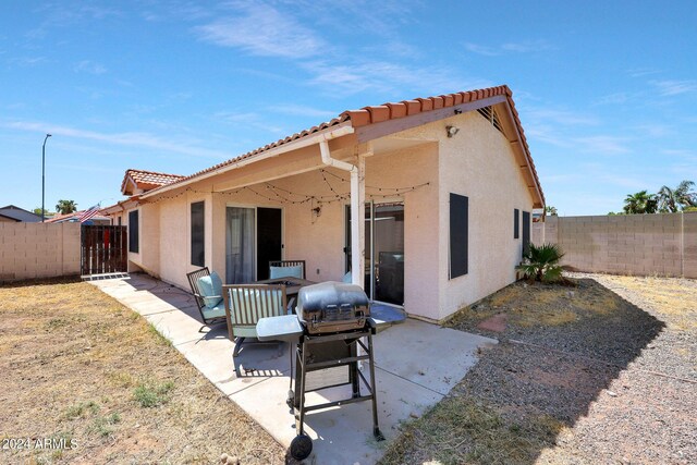 view of patio / terrace with a fire pit