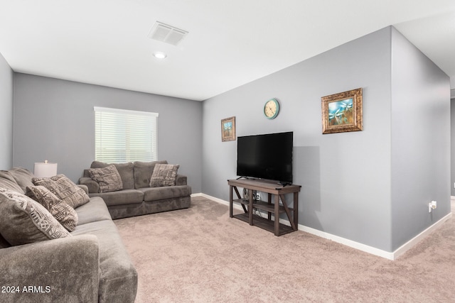 living room featuring light colored carpet