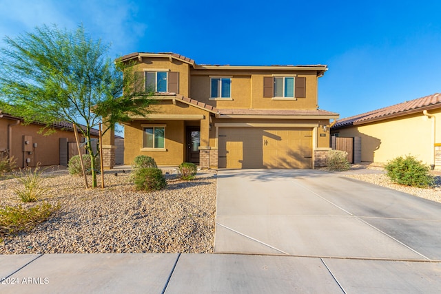 view of front of property with a garage